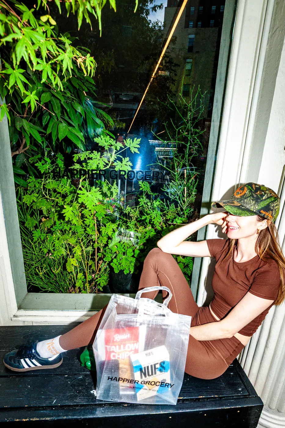 Sitting on the steps with a grocery haul